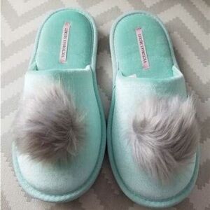 NWOT Victoria’s Secret mint green slippers with gray Pom Pom on top.  Size small